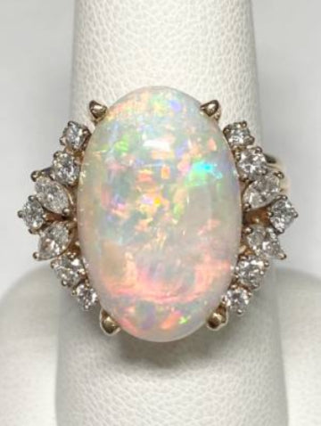 14KY 6.93ct Oval Opal With .76ctw Diamond Ring